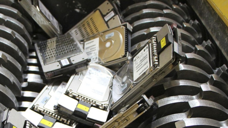 hard drives being shredded and turned into recycled metals
